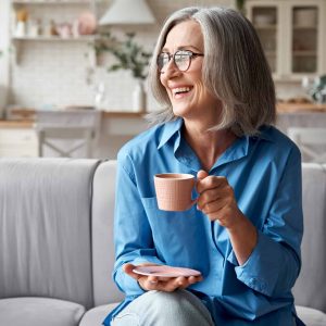 Happy,Beautiful,Relaxed,Mature,Older,Adult,Grey-haired,Woman,Drinking,Coffee